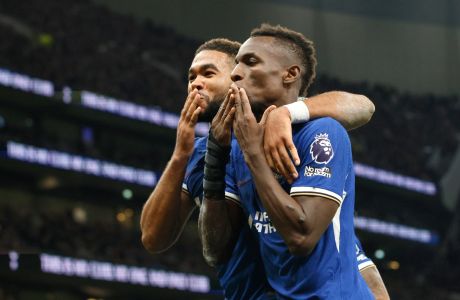 Chelsea's Nicolas Jackson, right, celebrates with Reece James after scoring his side's second goal during the English Premier League soccer match between Tottenham Hotspur and Chelsea, at Tottenham Hotspur Stadium, London, Monday, Nov. 6, 2023. (AP Photo/David Cliff)