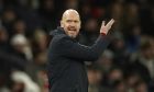 Manchester United's head coach Erik ten Hag gestures as he stands on the touchline during the English League Cup semifinal second leg soccer match between Manchester United and Nottingham Forest at Old Trafford in Manchester, England, Wednesday, Feb. 1, 2023. (AP Photo/Dave Thompson)