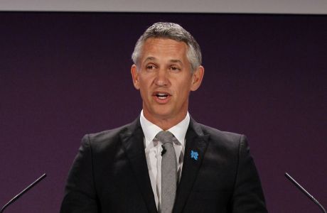 FILE- In this Tuesday, April 24, 2012, file photo, former England soccer player Gary Lineker speaks ahead of the draw for the London 2012 Olympic Soccer tournament, at Wembley Stadium in London. A list of top earners at the BBC shows that men dominate the highest paid jobs despite pledges to grant women equal pay. The BBC said Wednesday, July 11, 2018 its top earner is soccer presenter Gary Lineker, who took home between 1.75 million pounds ($2.32 million) and 1.76 million pounds. (AP Photo/Kirsty Wigglesworth, file)