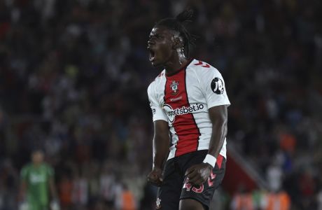 FILE - Southampton's Romeo Lavia celebrates after scoring his side's opening goal during the English Premier League soccer match between Southampton and Chelsea at St Mary's Stadium, Southampton, England, on Aug. 30, 2022. Belgium's new coach Domenico Tedesco dropped veteran midfielder Axel Witsel on Friday March 17, 2023 as he named his first squad since being appointed last month with a mission to rebuild. (AP Photo/Ian Walton, File)