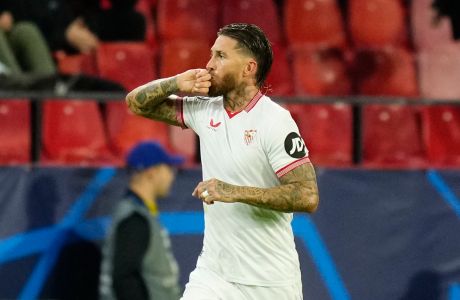 Sevilla's Sergio Ramos celebrates after scoring his side's first goal during the Champions League Group B soccer match between Sevilla and PSV at the Ramon Sanchez-Pizjuan stadium in Seville, Spain, Wednesday, Nov.29, 2023. (AP Photo/Jose Breton)