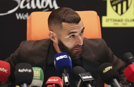 Saudi soccer team Al Ittihad player Karim Benzema speaks during a press conference at the presentation ceremony at King Abdullah Sports City Stadium in Jeddah, Saudi Arabia, Thursday, June 8, 2023. Benzema, who left Real Madrid after 14 years and 648 games, is set to play against his former Madrid teammate Cristiano Ronaldo, who joined Al-Nassr in January. (AP Photo)