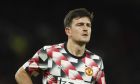 Manchester United's Harry Maguire warms up prior to the English League Cup third round soccer match between Manchester United and Aston Villa at Etihad Stadium in Manchester, England, Thursday, Nov. 10, 2022. (AP Photo/Dave Thompson)