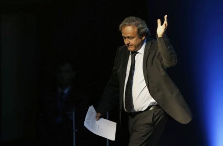 FILE - In this Wednesday, Sept. 14, 2016 file photo former UEFA President Michel Platini, waves after his speech during the vote for the new UEFA president in Athens. The former France soccer great who was banned by the FIFA ethics committee for alleged financial wrongdoing, Platini announced Wednesday Jan. 24, 2018, that is is taking his appeal to the European Court of Human Rights. (AP Photo/Thanassis Stavrakis, File)