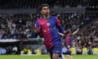 Barcelona's Lamine Yamal celebrates after scoring his side's third goal during a Spanish La Liga soccer match between Real Madrid and Barcelona at the Santiago Bernabeu stadium in Madrid, Spain, Saturday, Oct. 26, 2024. (AP Photo/Manu Fernandez)