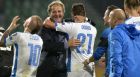 Head coach of Slovakia Jan Kozak (L) celebrates with his team after the Euro 2016 qualifing football match between Slovakia and Spain in northern Slovak town of Zilina on October 9, 2014.  AFP PHOTO / SAMUEL KUBANI        (Photo credit should read SAMUEL KUBANI/AFP/Getty Images)