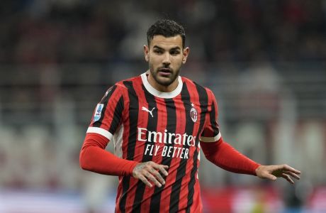 AC Milan's Theo Hernandez runs during the Serie A soccer match between AC Milan and Lecce at the San Siro stadium, in Milan, Italy, Friday, Sept. 27, 2024. (AP Photo/Antonio Calanni)