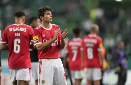 Benfica's Joao Neves waves supporters at the end of the Portuguese League soccer match between Sporting CP and Benfica at the Alvalade stadium in Lisbon, Sunday, May 21, 2023. (AP Photo/Armando Franca)