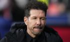 Atletico Madrid's head coach Diego Simeone gestures prior to the Champions League, round of 16, second leg soccer match between Atletico Madrid and Inter Milan at the Metropolitano stadium in Madrid, Spain, Wednesday, March 13, 2024. (AP Photo/Manu Fernandez)