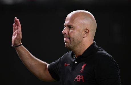 Liverpool manager Arne Slot walks off the field after an international friendly soccer match against Arsenal, Wednesday, July 31, 2024, in Philadelphia. (AP Photo/Derik Hamilton)