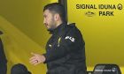 Assistant coach Nuri Sahin, right, talks to Dortmund's head coach Edin Terzic during the German Bundesliga soccer match between Borussia Dortmund and TSG Hoffenheim in Dortmund, Germany, Sunday, Feb. 25, 2024. (AP Photo/Martin Meissner)