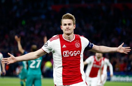 Ajax's Matthijs de Ligt celebrates after scoring the opening goal during the Champions League semifinal second leg soccer match between Ajax and Tottenham Hotspur at the Johan Cruyff ArenA in Amsterdam, Netherlands, Wednesday, May 8, 2019. (AP Photo/Peter Dejong)