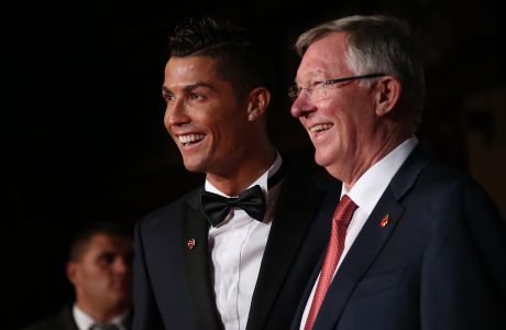 Sir Alex Ferguson, right, and Cristiano Ronaldo pose for photographers upon arrival at the world premiere of the film 'Ronaldo, in London, Monday, Nov. 9, 2015. (Photo by Joel Ryan/Invision/AP)