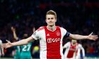 Ajax's Matthijs de Ligt celebrates after scoring the opening goal during the Champions League semifinal second leg soccer match between Ajax and Tottenham Hotspur at the Johan Cruyff ArenA in Amsterdam, Netherlands, Wednesday, May 8, 2019. (AP Photo/Peter Dejong)