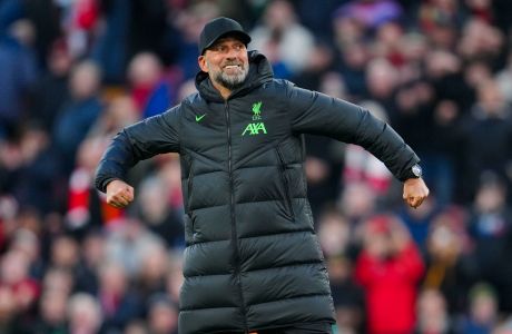 Liverpool's manager Jurgen Klopp celebrates at the end of the English Premier League soccer match between Liverpool and Burnley, at Anfield stadium in Liverpool, England, Saturday, Feb. 10, 2024. (AP Photo/Jon Super)