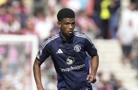 Manchester United's Amad Diallo during the English Premier League soccer match between Southampton and Manchester United at St. Mary's stadium in Southampton, England, Saturday, Sept. 14, 2024. (AP Photo/Alastair Grant)