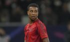 Bayern's Michael Olise walks during the German Bundesliga soccer match between Eintracht Frankfurt and Bayern Munich in Frankfurt, Germany, Sunday, Oct. 6, 2024. (AP Photo/Michael Probst)