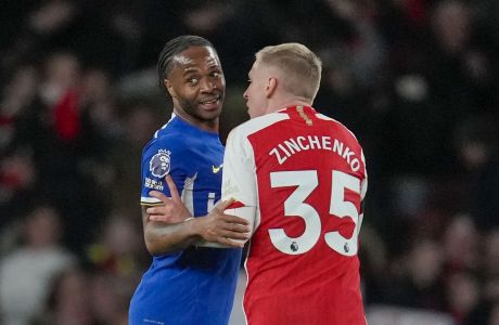 Arsenal's Oleksandr Zinchenko, right, speaks with Chelsea's Raheem Sterling at the end of the English Premier League soccer match between Arsenal and Chelsea at Emirates Stadium in London, Tuesday, April 23, 2024. (AP Photo/Kin Cheung)