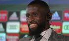 Real Madrid's new signing Antonio Rudiger smiles before the start of a press conference at the club's training ground in Madrid, Spain, Monday, June 20, 2022. (AP Photo/Paul White)