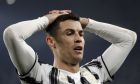 Juventus' Cristiano Ronaldo reacts after failing to score during the Champions League, round of 16, second leg, soccer match between Juventus and Porto in Turin, Italy, Tuesday, March 9, 2021. (AP Photo/Luca Bruno)