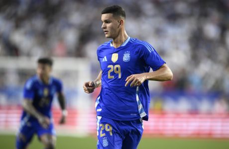 Argentina midfielder Valentin Carboni in action during the first half of an international friendly soccer match against Guatemala, Friday, June 14, 2024, in Landover, Md. (AP Photo/Nick Wass)