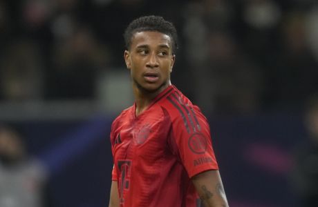 Bayern's Michael Olise walks during the German Bundesliga soccer match between Eintracht Frankfurt and Bayern Munich in Frankfurt, Germany, Sunday, Oct. 6, 2024. (AP Photo/Michael Probst)