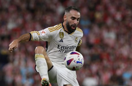 Real Madrid's Dani Carvajal controls the ball during the Spanish La Liga soccer match between Athletic Club and Real Madrid at the San Mames stadium in Bilbao, Spain, Saturday, Aug. 12, 2023. (AP Photo/Alvaro Barrientos)