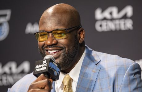 Shaquille O'Neal, speaks during a pre-game press conference about the Orlando Magic retiring his jersey before the Oklahoma City Thunder NBA basketball game, Tuesday, Feb. 13, 2024, in Orlando, Fla. (AP Photo/Kevin Kolczynski)