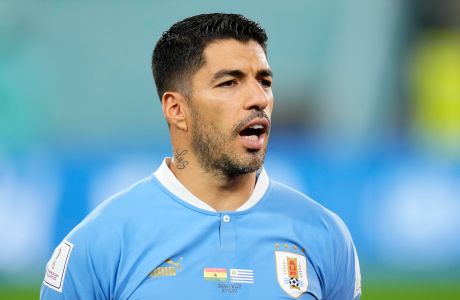 Uruguay's Luis Suarez sings the national anthem before the World Cup group H soccer match between Ghana and Uruguay, at the Al Janoub Stadium in Al Wakrah, Qatar, Friday, Dec. 2, 2022. (AP Photo/Manu Fernandez)