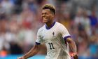 France's Desire Doue celebrates after scoring his side's second goal during the men's Group A soccer match between New Zealand and France at the Velodrome Stadium, during the 2024 Summer Olympics, Tuesday, July 30, 2024, in Marseille, France. (AP Photo/Daniel Cole)