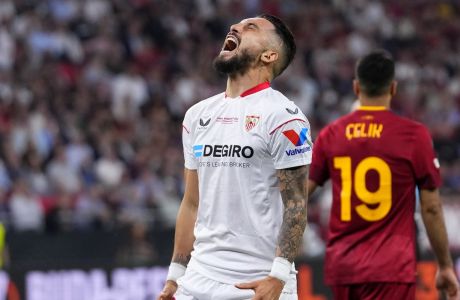 Sevilla's Alex Telles reacts during the Europa League final soccer match between Sevilla and Roma, at the Puskas Arena in Budapest, Hungary, Wednesday, May 31, 2023. (AP Photo/Petr David Josek)