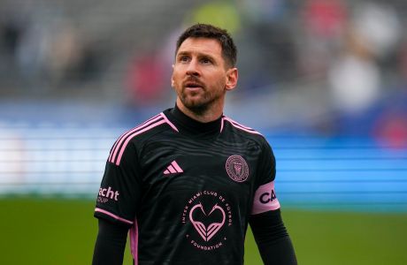 Inter Miami's Lionel Messi looks on during the first half of a preseason friendly MLS soccer match against FC Dallas Monday, Jan. 22, 2024, at the Cotton Bowl in Dallas. (AP Photo/Julio Cortez)