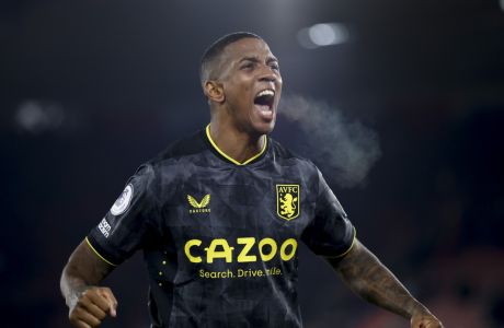 Aston Villa's Ashley Young celebrates after his side's 1-0 victory in the English Premier League soccer match between Southampton and Aston Villa at St Mary's Stadium in Southampton, England, Saturday, Jan. 21, 2023. (AP Photo/David Cliff)