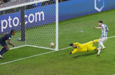 Argentina's Lionel Messi scores his side's 3rd goal during the World Cup final soccer match between Argentina and France at the Lusail Stadium in Lusail, Qatar, Sunday, Dec. 18, 2022. (AP Photo/Hassan Ammar)