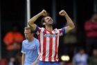 Atletico Madrid's Francisco Juanfran celebrates his goal against Celta Vigo during their Spanish First Division soccer match at the Balaidos stadium in Vigo May 8, 2013. REUTERS/Miguel Vidal