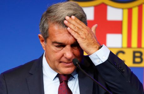 FC Barcelona club President Joan Laporta begins a news conference in Barcelona, Spain, Friday, Aug. 6, 2021. Barcelona's announcement that Lionel Messi would be leaving the club set Paris Saint-Germain scrambling to figure out if it could sign the most desired free agent in soccer history. (AP Photo/Joan Monfort)