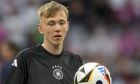 Germany's Maximilian Beier controls the ball during warm up before a Group A match between Germany and Scotland at the Euro 2024 soccer tournament in Munich, Germany, Friday, June 14, 2024. (AP Photo/Antonio Calanni)