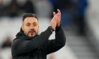 Brighton's head coach Roberto De Zerbi applauds to supporters at the end of the English Premier League soccer match between West Ham and Brighton, at the London stadium in London, Tuesday, Jan. 2, 2024. (AP Photo/Kirsty Wigglesworth)