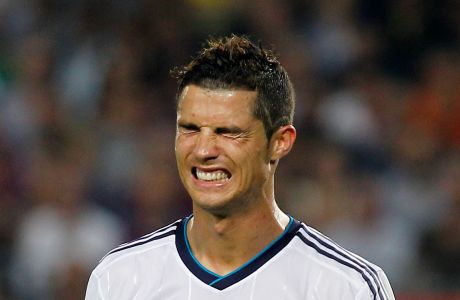 Real Madrid's Cristiano Ronaldo from Portugal gestures during a Spanish La Liga soccer match against  FC Barcelona at the Camp Nou stadium in Barcelona, Spain, Sunday, Oct. 7, 2012. (AP Photo/Andres Kudacki)