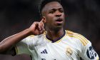 Real Madrid's Vinicius Junior celebrates after scoring his side's opening goal during the Champions League round of 16 second leg soccer match between Real Madrid and RB Leipzig at the Santiago Bernabeu stadium in Madrid, Spain, Wednesday, March 6, 2024. (AP Photo/Manu Fernandez)