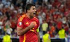 Spain's Rodri celebrates at the end of the semifinal match between Spain and France at the Euro 2024 soccer tournament in Munich, Germany, Tuesday, July 9, 2024. (AP Photo/Hassan Ammar)