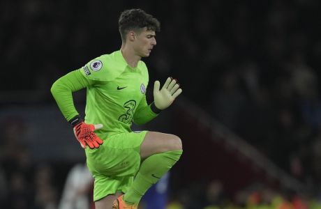 Chelsea's goalkeeper Kepa Arrizabalaga warms up during the English Premier League soccer match between Arsenal and Chelsea at the Emirates Stadium in London, Tuesday, May 2, 2023. (AP Photo/Kin Cheung)