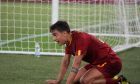 Roma's Paulo Dybala pauses on the pitch during the Italian Serie A soccer match between Roma and Monza at Rome's Olympic Stadium, Tuesday, Aug. 30, 2022. (AP Photo/Gregorio Borgia)