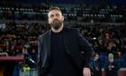 Roma's head coach Daniele De Rossi waves supporters prior to the start of the Series A soccer match between Roma and Hellas Verona at the Rome Olympic stadium, Saturday, Jan. 20, 2024. (AP Photo/Andrew Medichini)