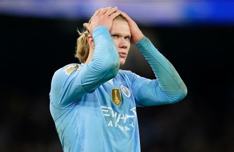 Manchester City's Erling Haaland reacts after missing a chance during the English Premier League soccer match between Manchester City and Chelsea at the Etihad stadium in Manchester, England, Saturday, Feb. 17, 2024. (AP Photo/Dave Thompson)