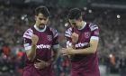 West Ham's Lucas Paqueta, left, celebrates with West Ham's Nayef Aguerd after scoring his side's second goal during the Conference League soccer match between West Ham and Gent at the London stadium in London, England, Thursday, April 20, 2023. (AP Photo/Kin Cheung)