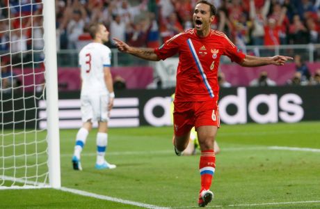 Russia's Roman Shirokov celebrates after scoring their second goal against Czech Republic's during their Group A Euro 2012 soccer match at the city stadium in Wroclaw June 8, 2012. REUTERS/Sergio Perez (POLAND  - Tags: SPORT SOCCER)  