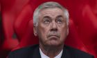 Real Madrid's head coach Carlo Ancelotti sits on the bench during the Champions League final soccer match between Borussia Dortmund and Real Madrid at Wembley stadium in London, Saturday, June 1, 2024. (AP Photo/Ian Walton)