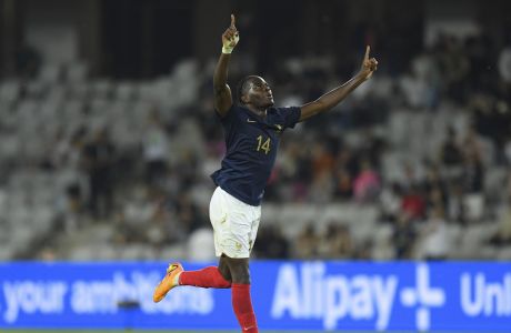 France's Castello Lukeba celebrates at the end of the Euro 2023 U21 Championship soccer match between France and Italy at the Cluj Arena stadium in Cluj, Romania, Thursday, June 22, 2023.(AP Photo/Raed Krishan)