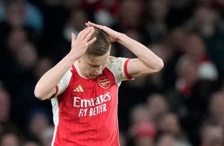 Arsenal's Oleksandr Zinchenko reacts during the Champions League quarter final first leg soccer match between Arsenal and Bayern Munich at the Emirates Stadium, London, Tuesday, April 9, 2024. (AP Photo/Frank Augstein)